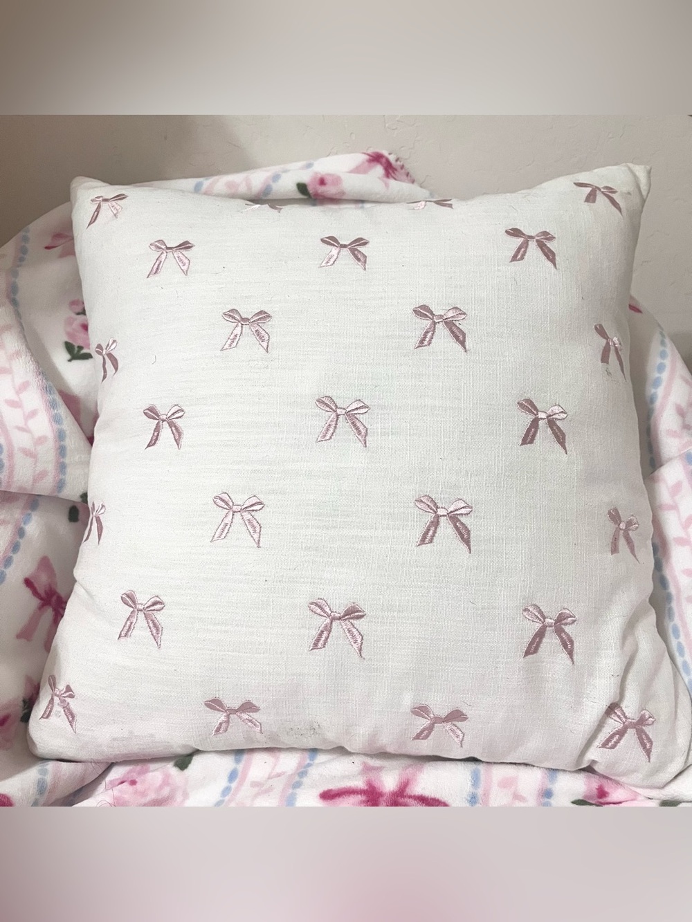 Indigo White Decorative Pillow with Pink Bows